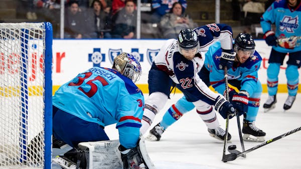 K-WINGS BATTLE, BUT OILERS PULL AWAY IN THIRD