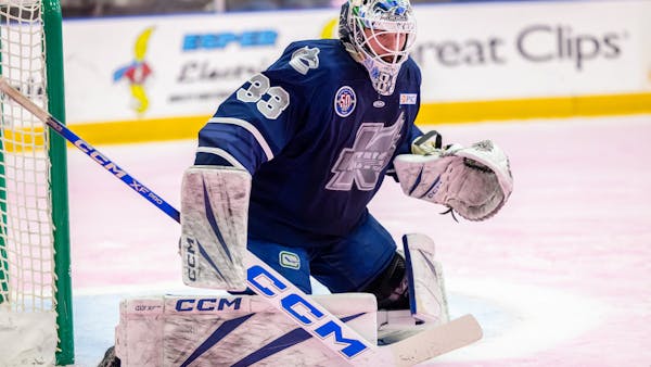 K-WINGS BLANK BISON ON PINK ICE IN FRONT OF SOLD OUT CROWD