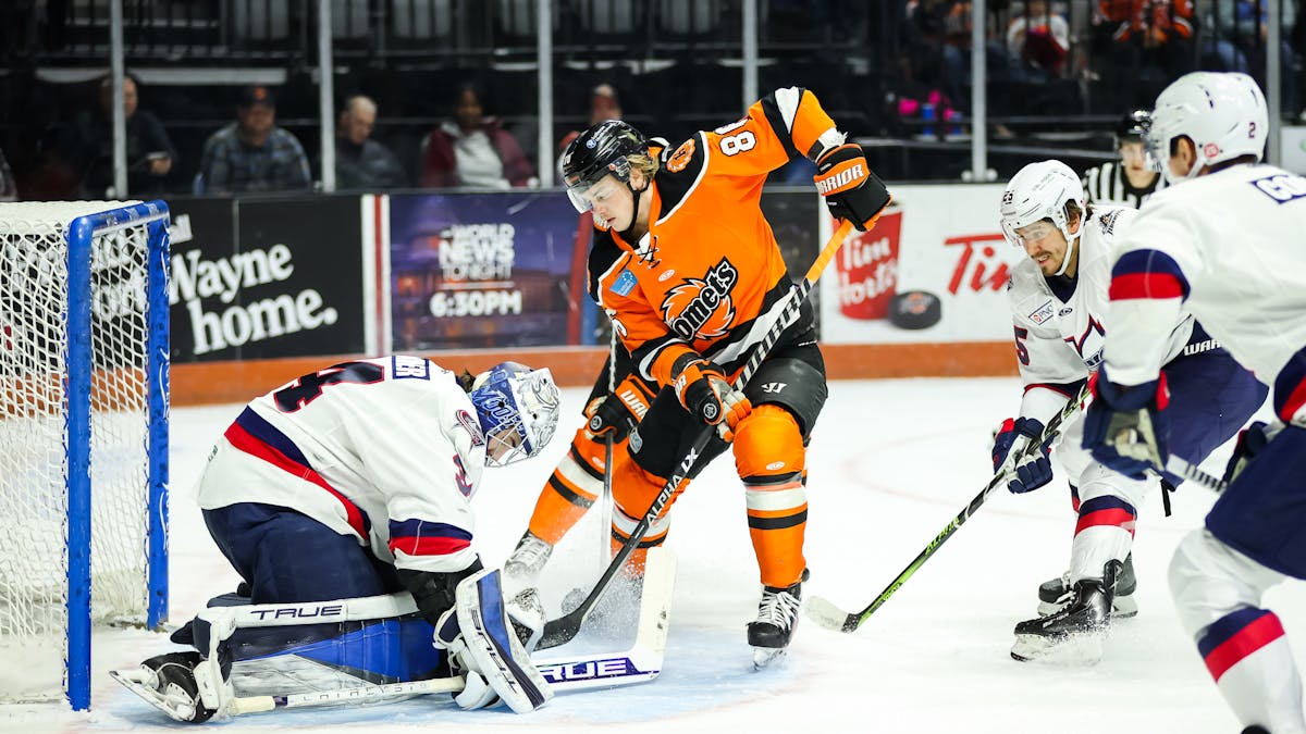K-WINGS TAKE POINT IN HIGH-SCORING AFFAIR WITH KOMETS