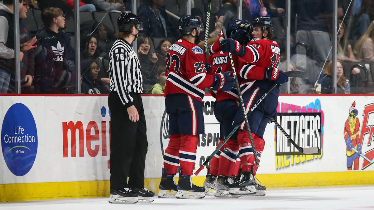 KALAMAZOO TEACHES EDUCATION DAY LESSON, SCORES SIX IN TOLEDO