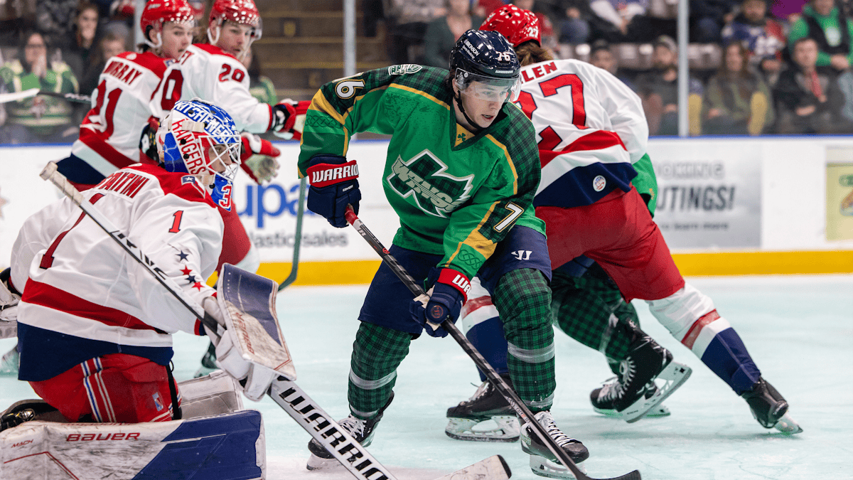 K-WINGS WELCOME 5,217, FALL TO AMERICANS ON GREEN ICE